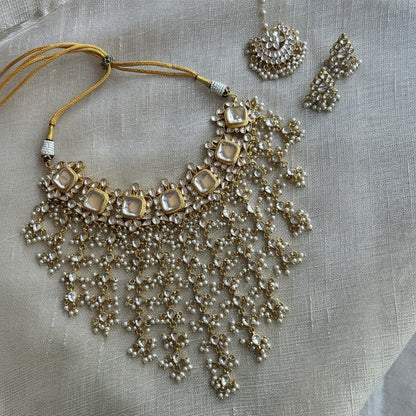 The Jewel Project GIGI LUXE KUNDAN SET necklace with pearl drops, tikka, and stud earrings. Gold tone with clear Kundan stones.