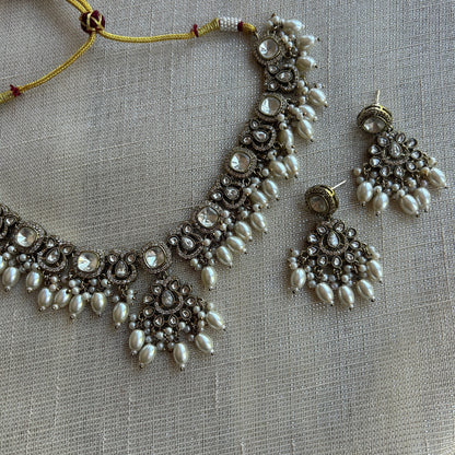 The Jewel Project antique silver necklace set with pearls and clear stones, includes matching Chandbali earrings.
